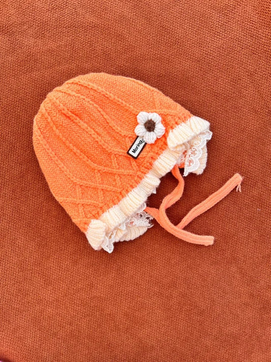 Knitted Baby Cap – Soft and Warm Winter Hat with Ties