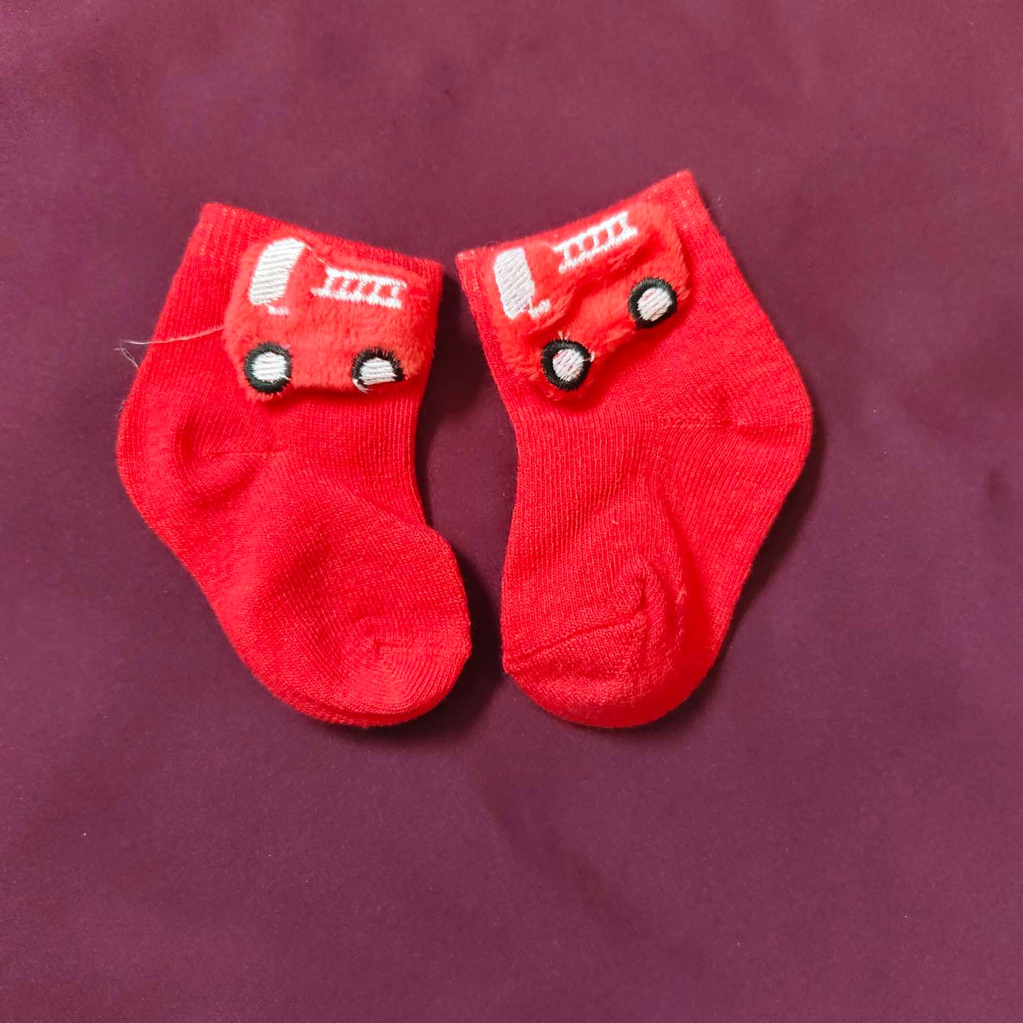 Pack of 2 Baby Socks with Hand Band – 0 to 6 Months