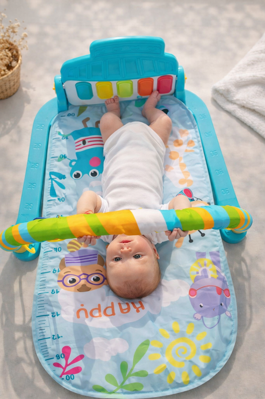 Baby lying on a colorful play mat with cartoon characters